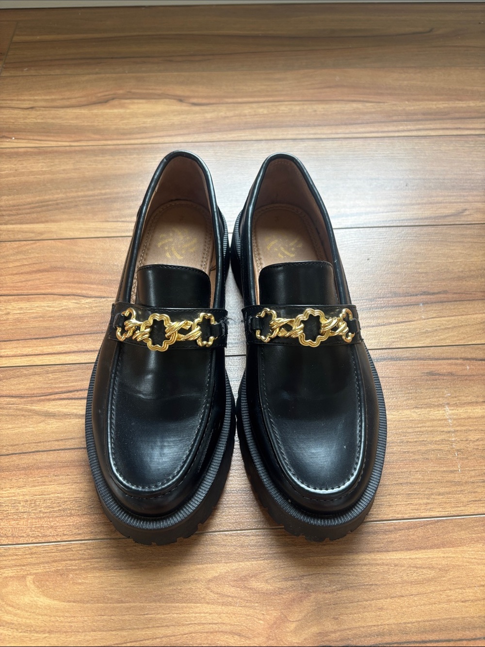 Black Leather Women’s Loafers with Gold Chain Accent